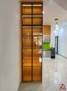 Tủ trưng bày gỗ công nghiệp cao kịch trần, thiết kế cánh kính và đèn led nổi bật không gian