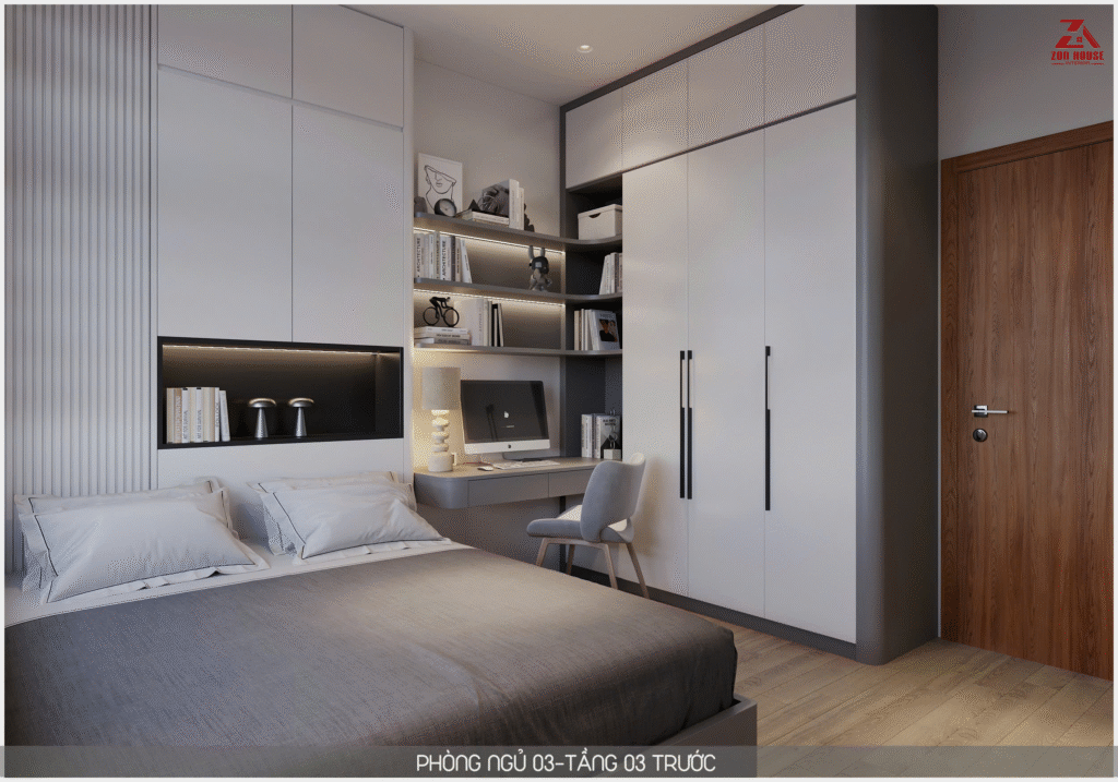 Góc làm việc được tích hợp thông minh giữa hệ tủ quần áo và kệ sách treo tường nhằm tối ưu không gian