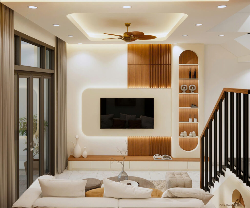 Mảng tường tivi được thiết kế kết hợp giữa gỗ nâu ấm áp và viền đèn LED hắt sáng tinh tế