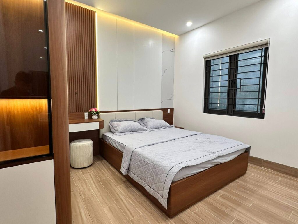 Thiết kế phòng ngủ sử dụng tông màu gỗ ấm áp tạo cảm giác thư thái